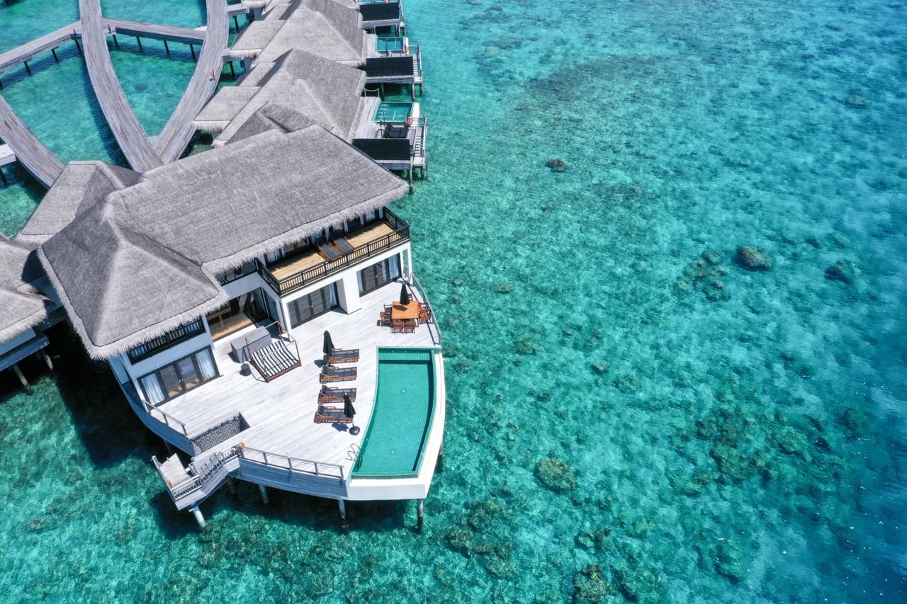About Breathtaking aerial view of a luxury overwater villa at Gaafu Dhaalu Atoll, Maldives.